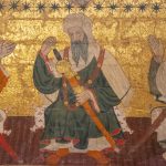 Painting and gold leaf with Arabic and Moorish style scene on a vaulted ceiling of the Nasrid palaces of the Alhambra in the city of Granada, Spain