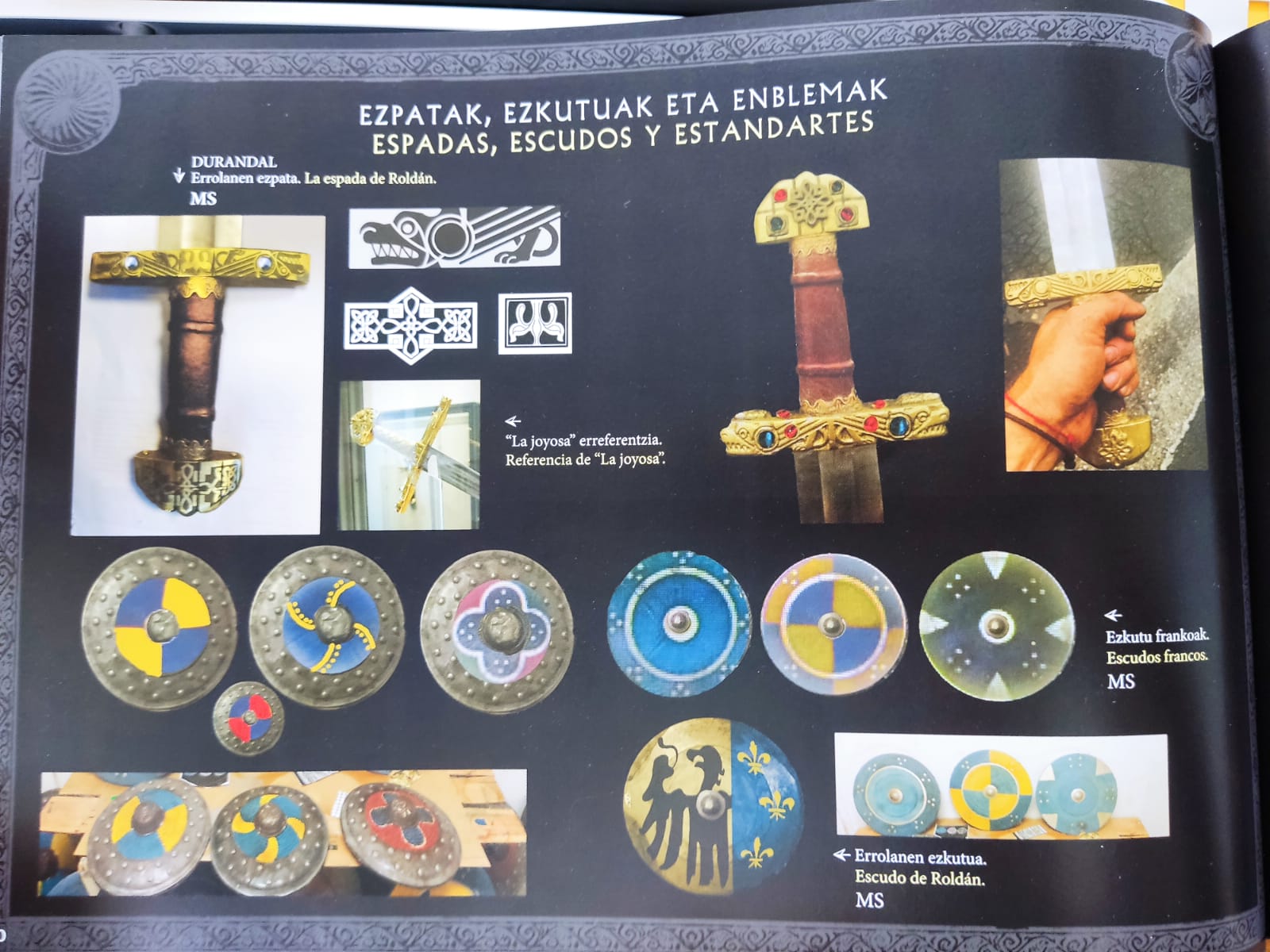 Puede ser una imagen de texto que dice "EZPATAK, EZKUTUAK ETA ENBLEMAK ESPADAS, ESCUDOS Y ESTANDARTES DURANDAL Errolanen . Erolanenepeib.LacepudndeRoldin La espada de Roldán. MS "Lajoyosa"erreferentzia. "La ajoyosa" erreferentzia. Referencia de La ajoyosa". n Ezkutu frankoak. Escudos francos. MS OOGF Errolanenezkutua. ← Errolanen ezkutua. Escudo de Roldán. MS"